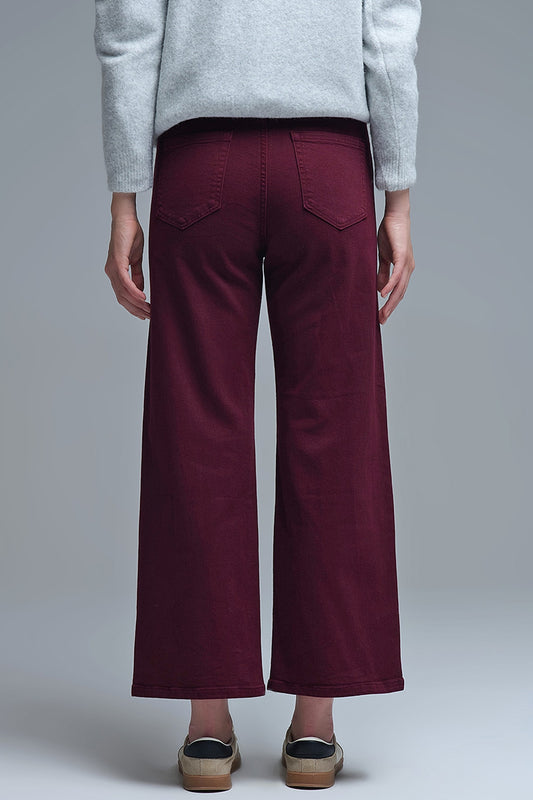 Cropped wide leg jeans in burgundy