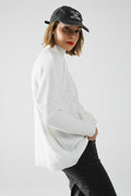 oversized soft knitted white sweater with ribbed sleeves