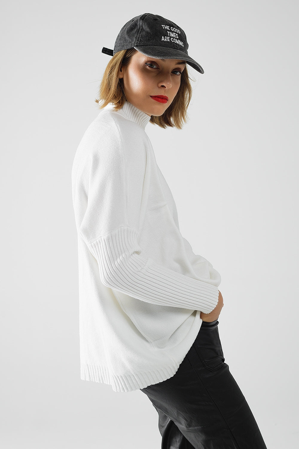 oversized soft knitted white sweater with ribbed sleeves