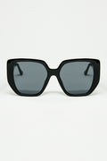 Black pin-up style sunglasses with geometric design and cat eyes