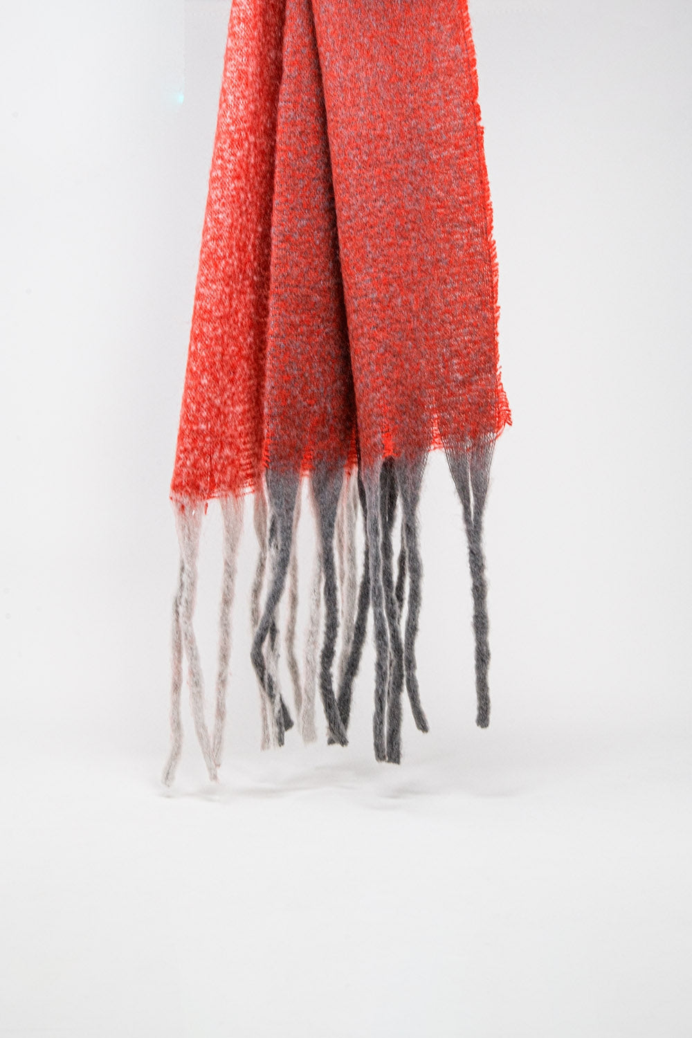 Chunky knit scarf in red color block with fringes