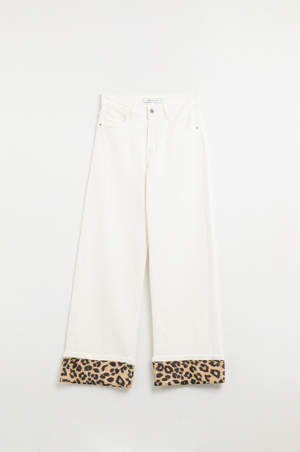 Wide leg cream pants with leopard print at the bottom