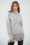 grey turtleneck jumper with dropped sleeves