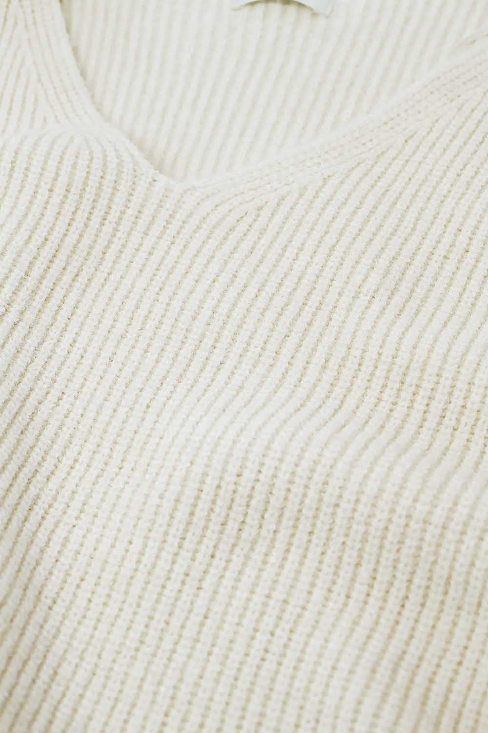 cream oversized knit sweater with V neck