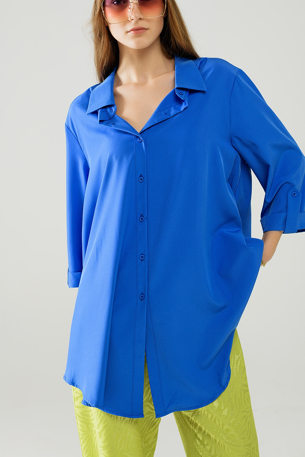 Shirt made of very soft and lightweight fabric in electric blue color.