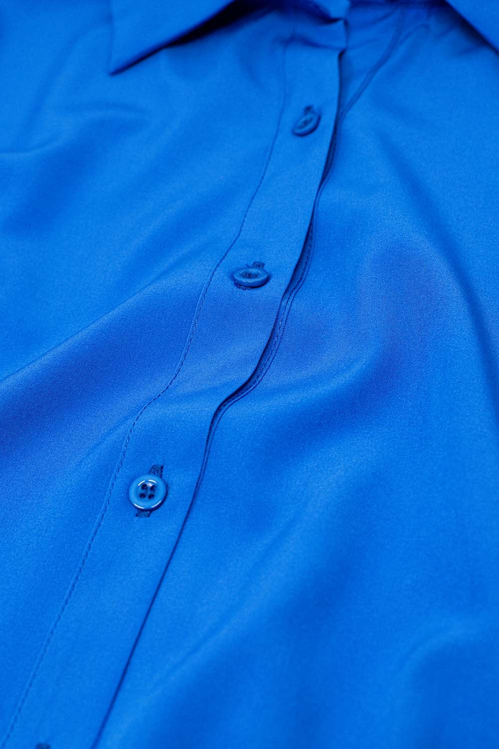 Shirt made of very soft and lightweight fabric in electric blue color.