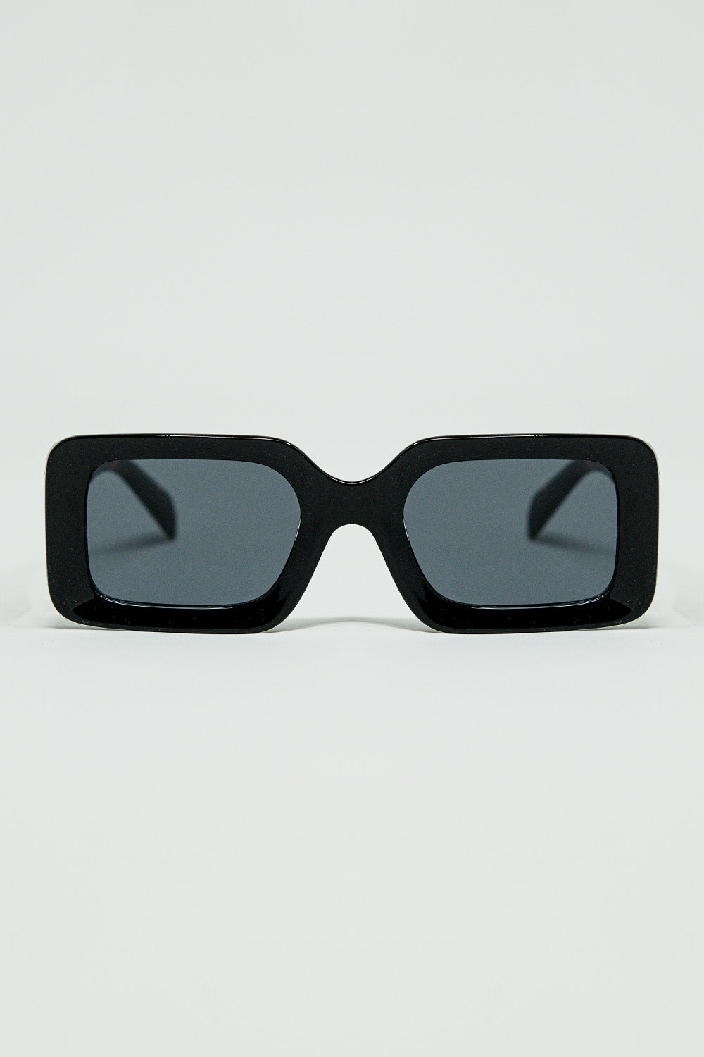 Black square sunglasses with brown animal print on the side
