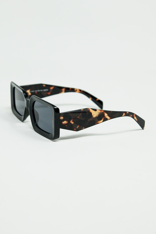 Black square sunglasses with brown animal print on the side — view 2 of 3