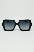 Wide square frame sunglasses with gold detail on the temples