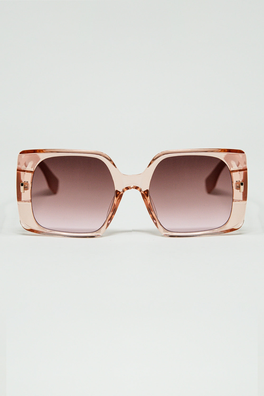 Pink square sunglasses with gold detail on the side