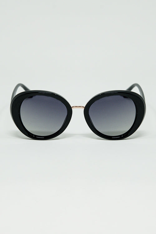 Black Oval Shaped Sunglasses with metal gold detail — view 1 of 3