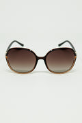 Round sunglasses in caramel color with gold metal detail