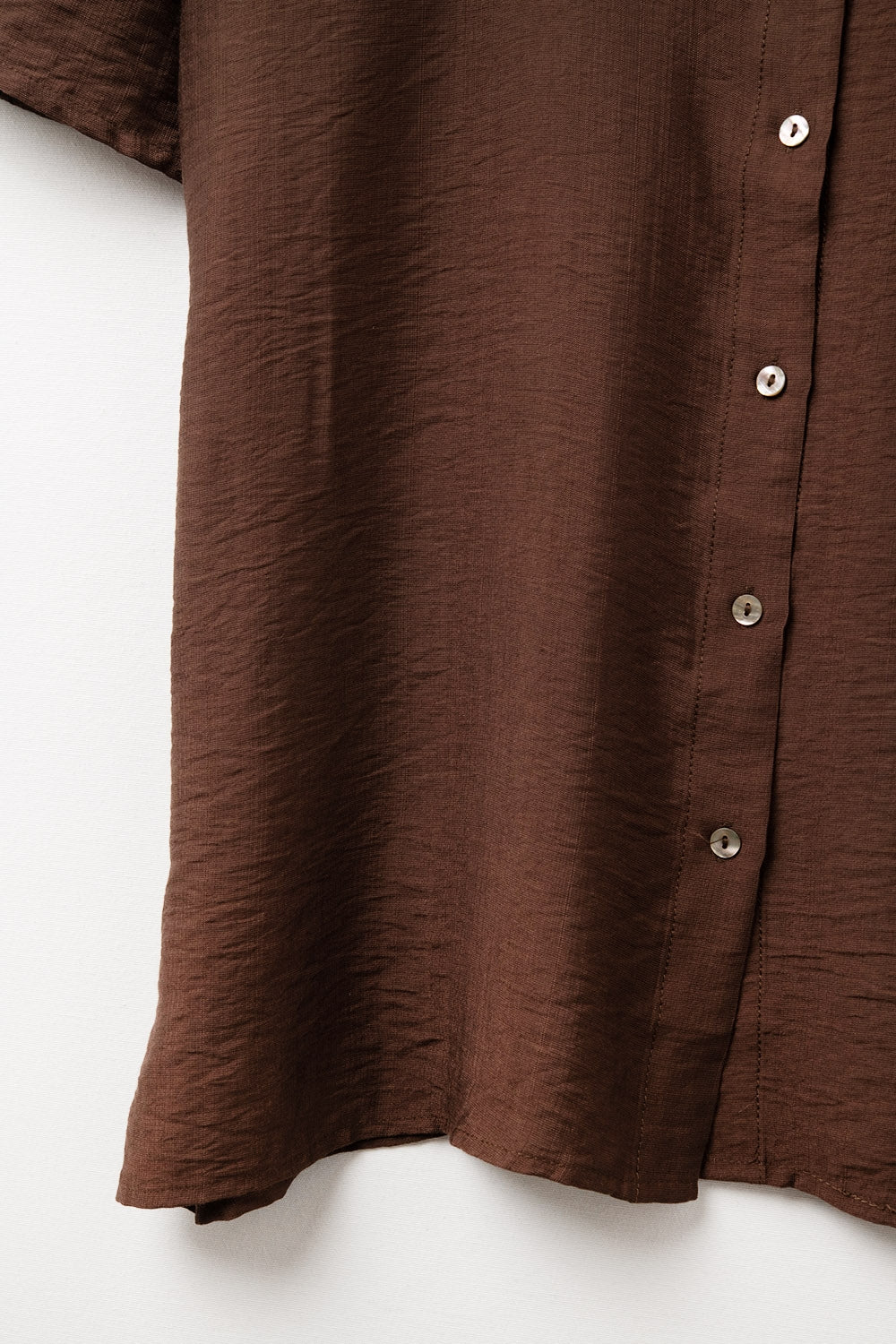 Chocolate Brown shirt with short sleeves and pleat on the sleeve