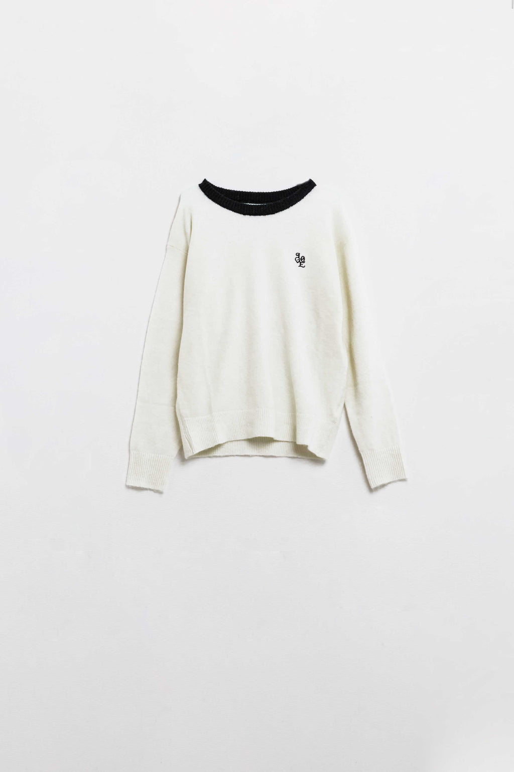 White sweater with contrasting collar and love logo on chest