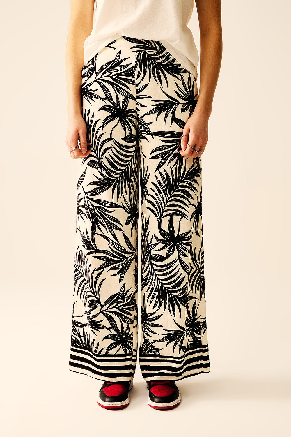Wide Leg Pants In White With Floral Detail In Black