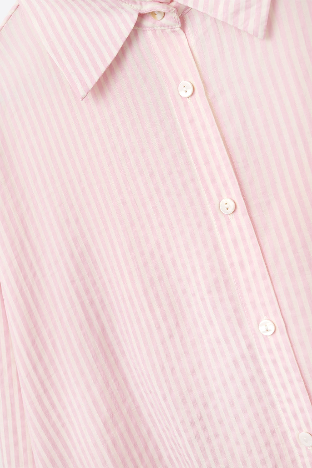 oversized baby pink shirt with bow in the back