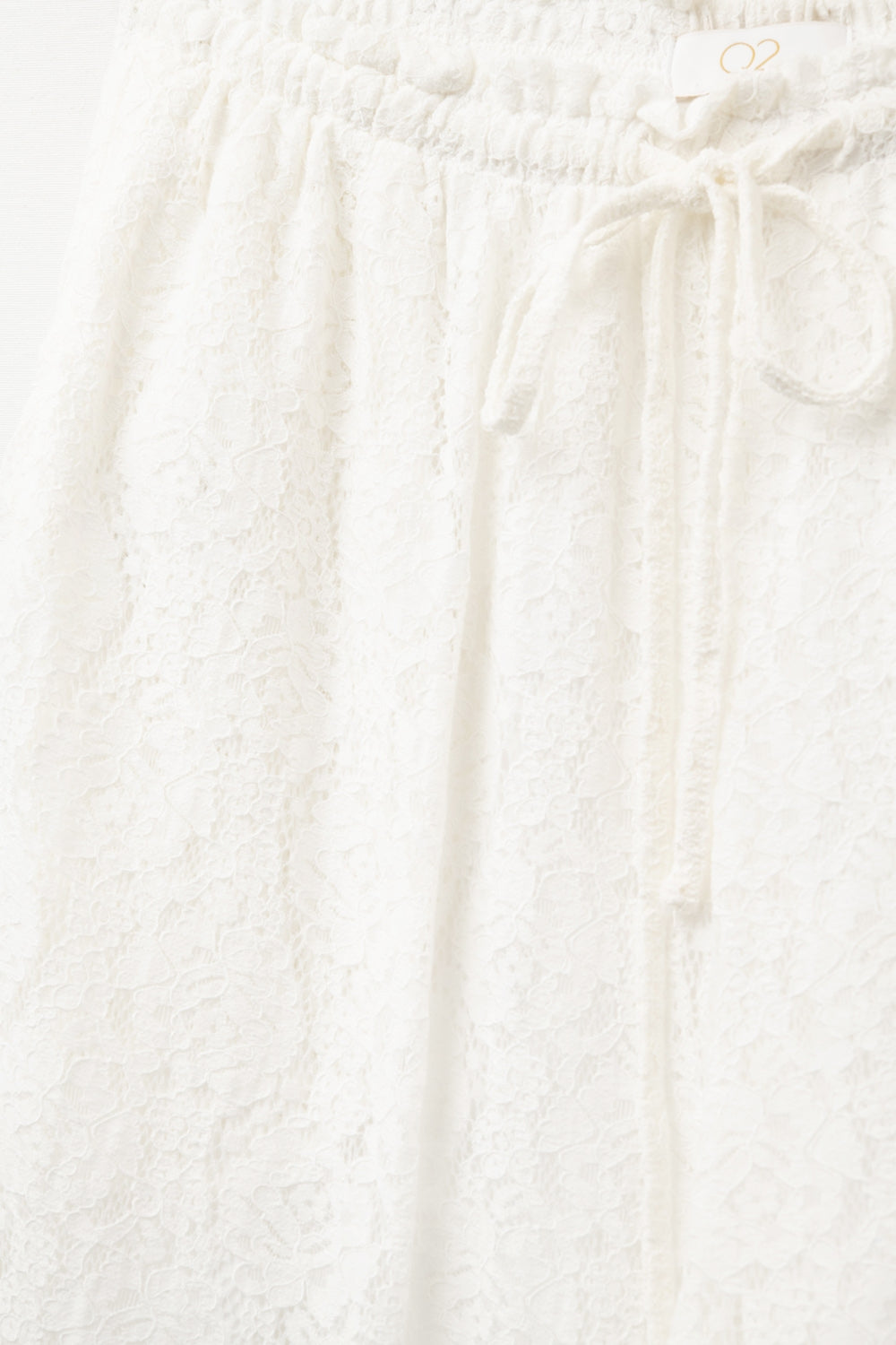 wide-legged lace pants with elastic waistband