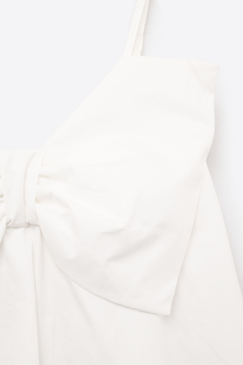 White poplin mini dress with a big bow detail