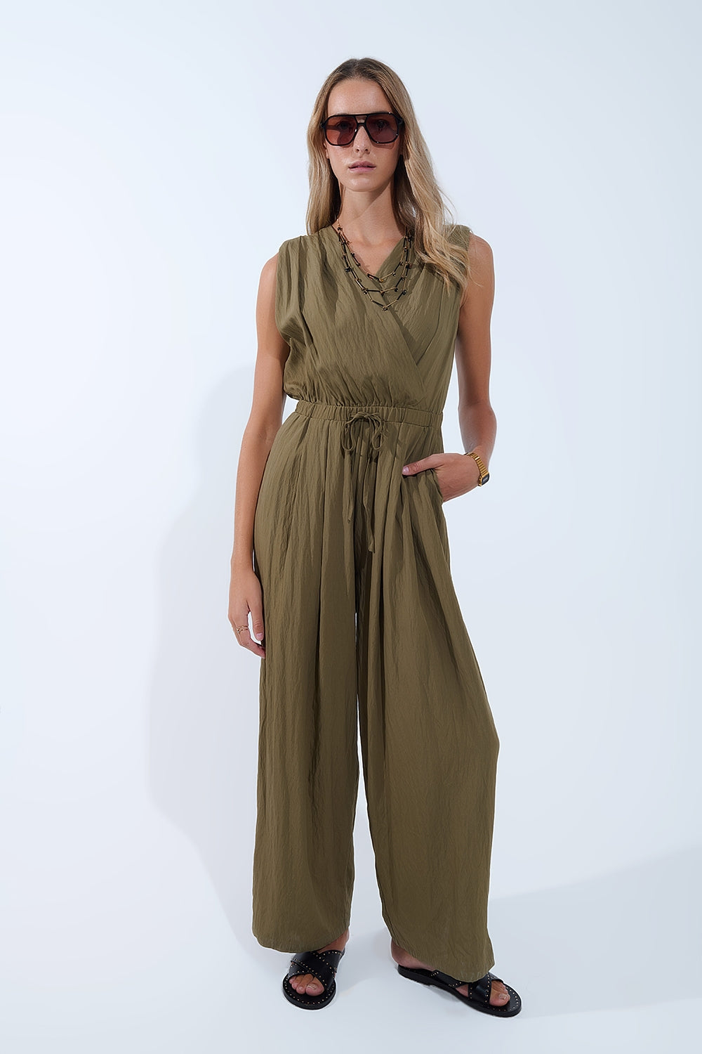 UNIKCOSA draped olive jumpsuit in crinkled fabric