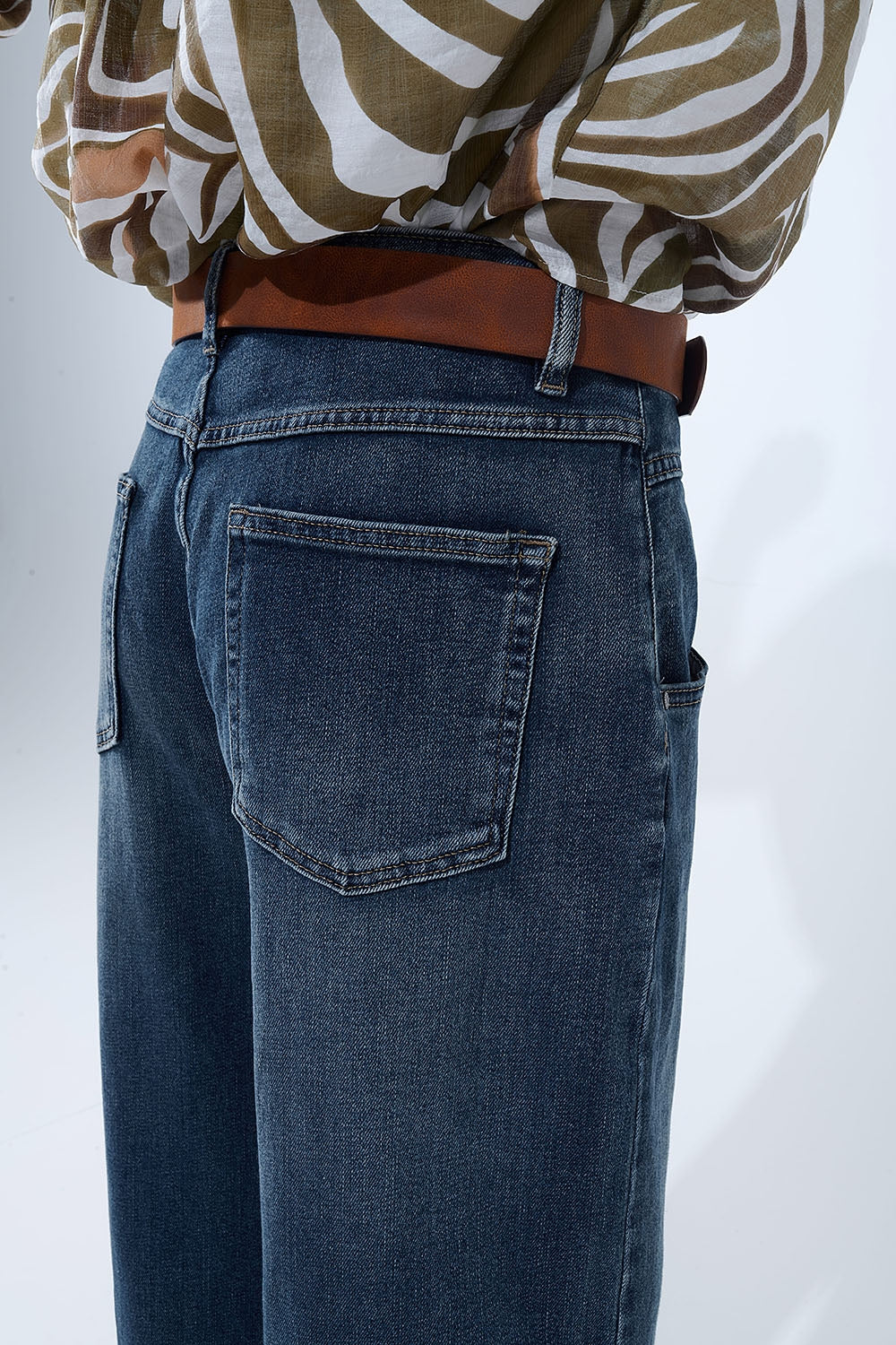 UNIKCOSA dark blue vintage-wash wide-leg jeans