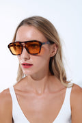 Retro Style Sunglasses with brown Tortoise Shell frames and orange lenses