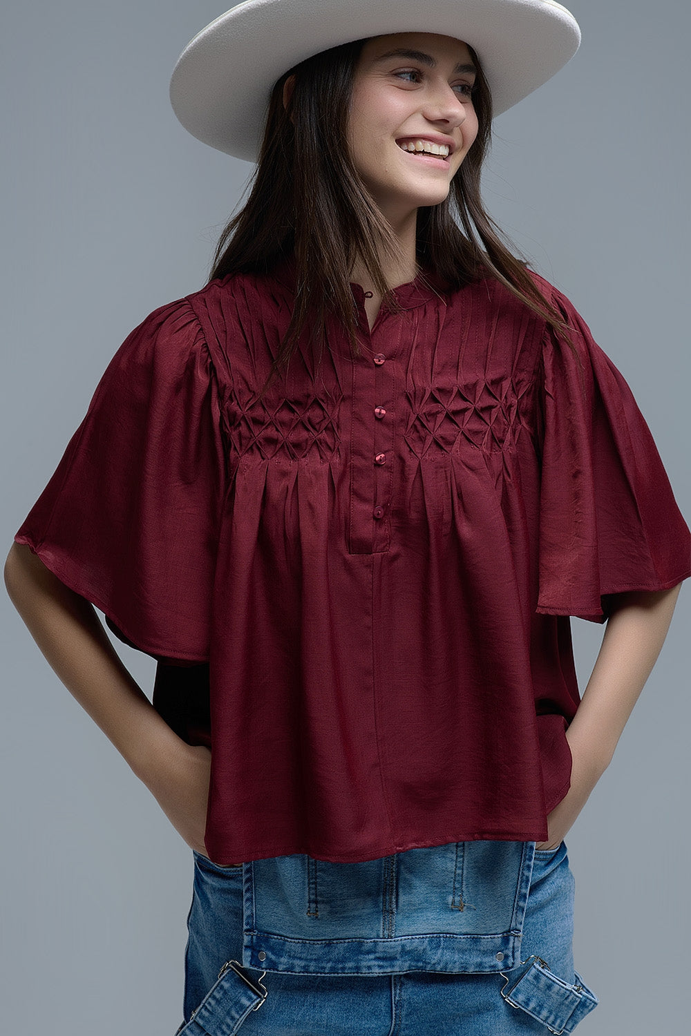 Relaxed wine-colored boho-style blouse with embroidered details