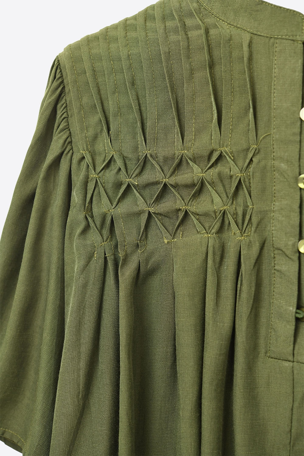 Relaxed Green boho-style blouse with embroidered details