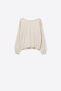 cream fine knit sweater with a boat neck and rhinestone detail