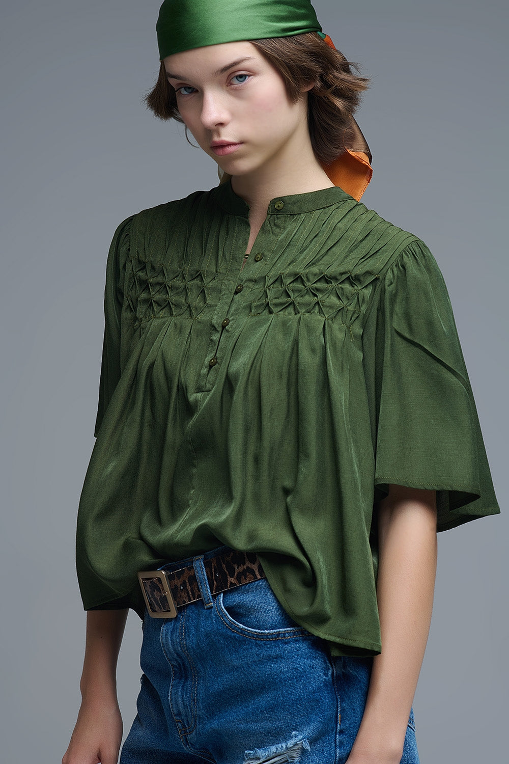 Relaxed Green boho-style blouse with embroidered details