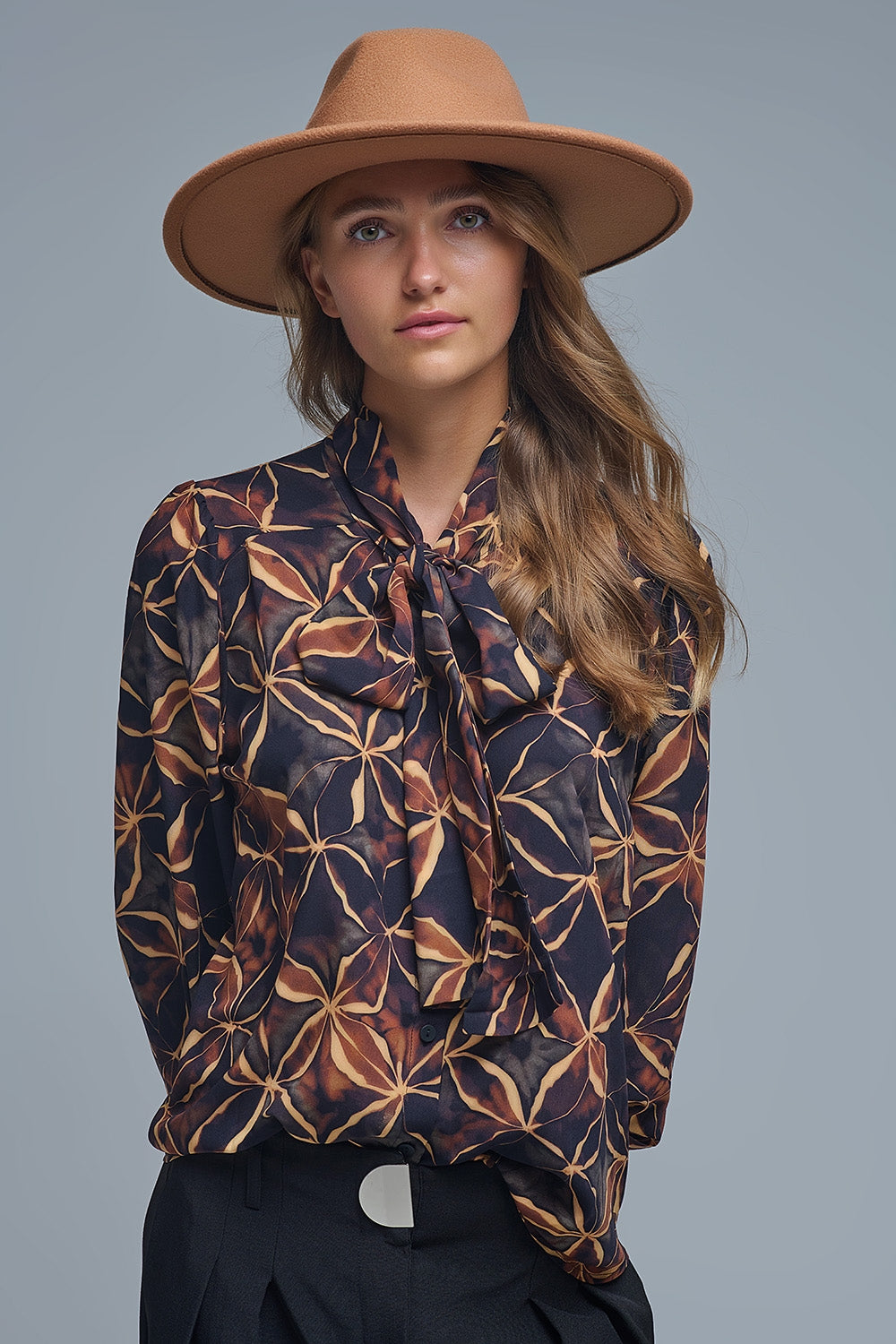 Black chiffon shirt with abstract print and knotted bow