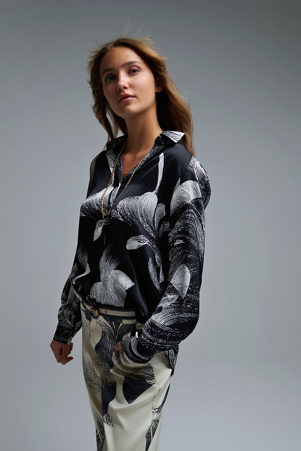 UNIKCOSA Black Satin blouse in abstract print