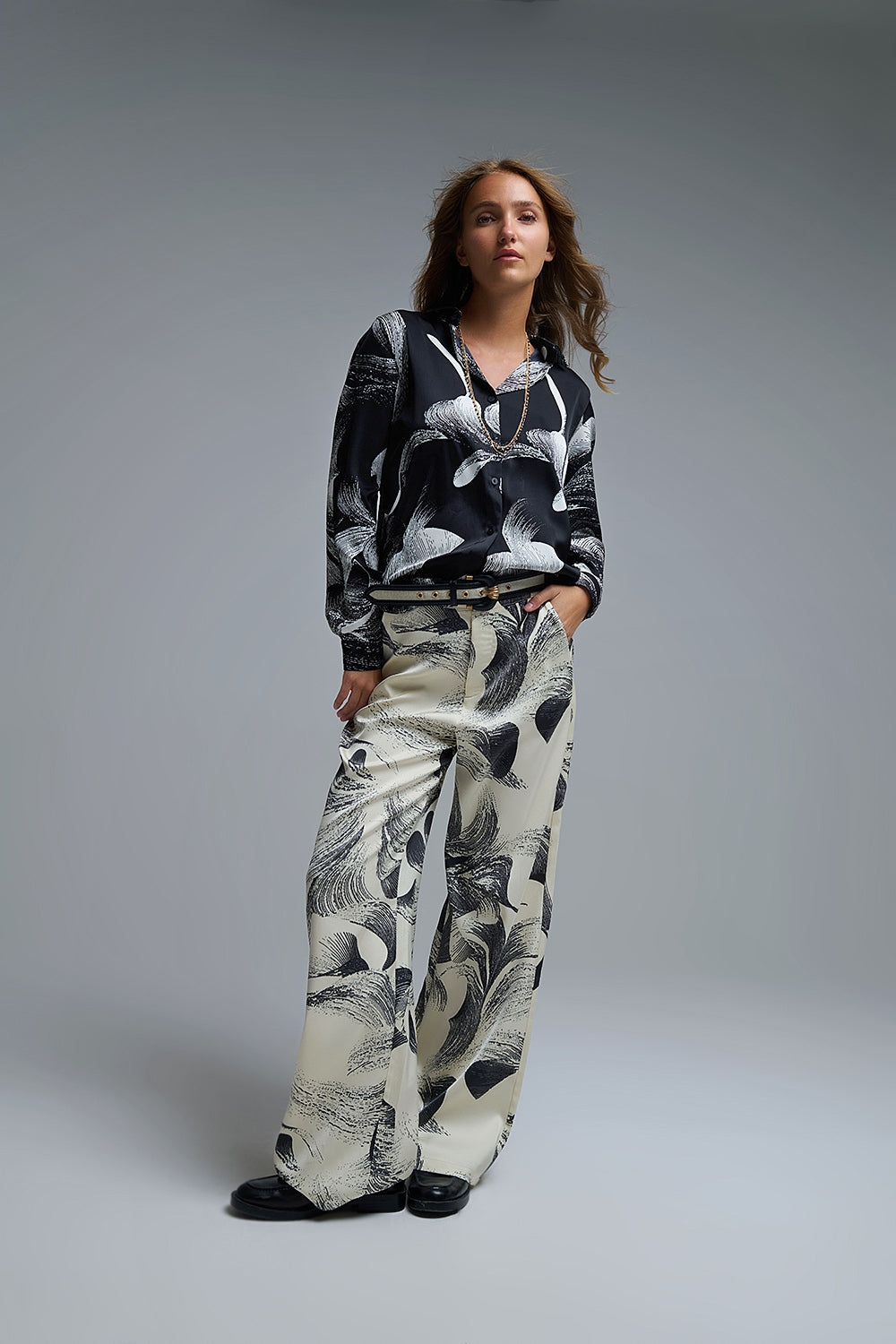 UNIKCOSA Black Satin blouse in abstract print