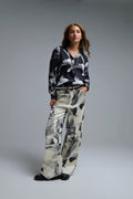 UNIKCOSA Black Satin blouse in abstract print