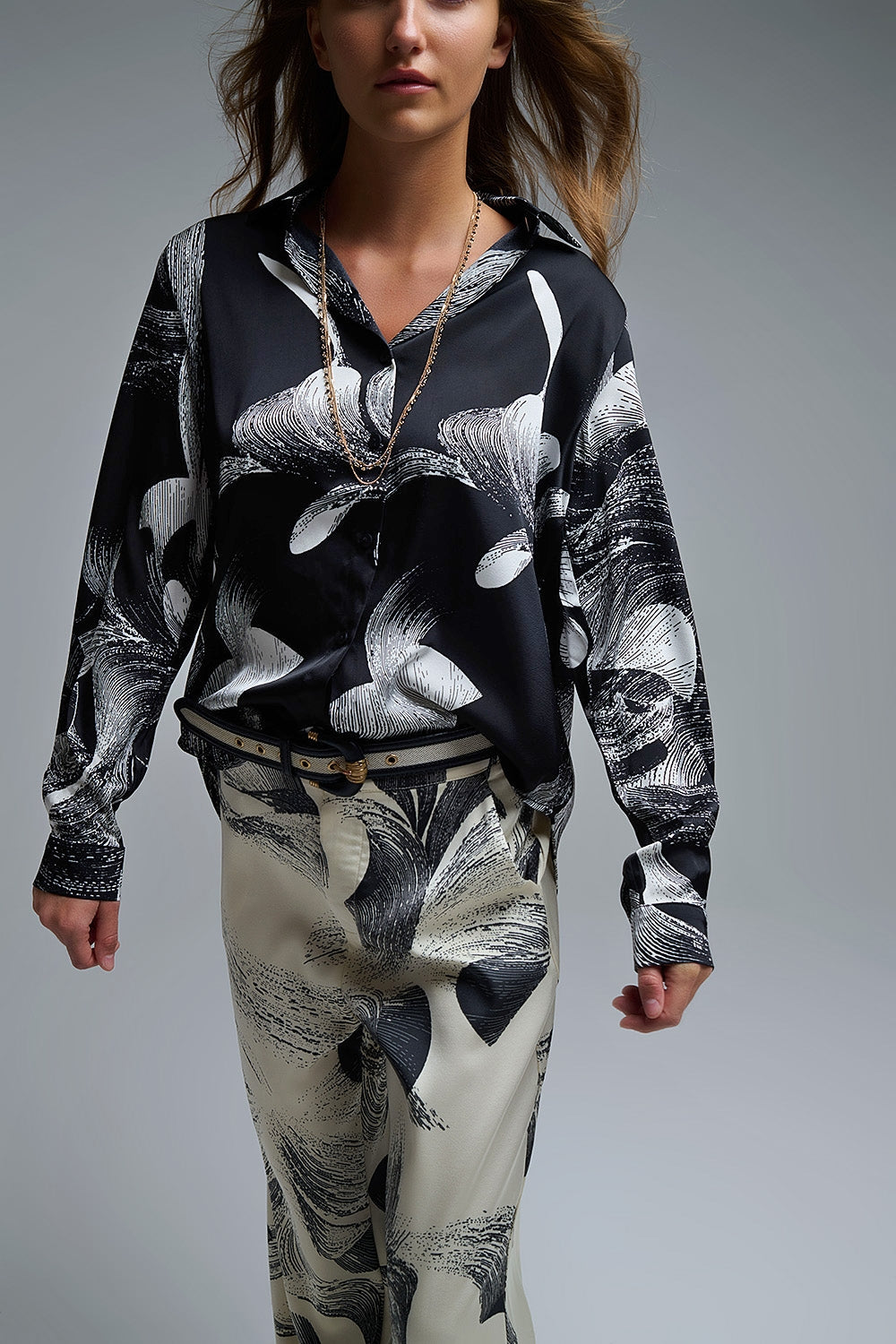 UNIKCOSA Black Satin blouse in abstract print