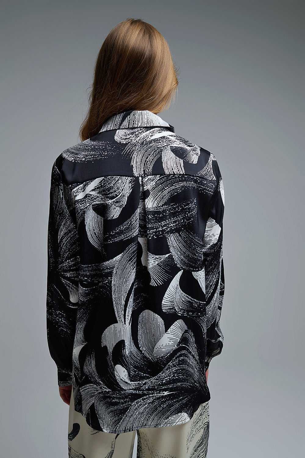 UNIKCOSA Black Satin blouse in abstract print