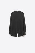Loose black sweater with open back detail