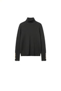 Black turtleneck sweater with gold buttons on the cuff