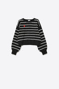 Black knit sweater with red heart detail and white striped