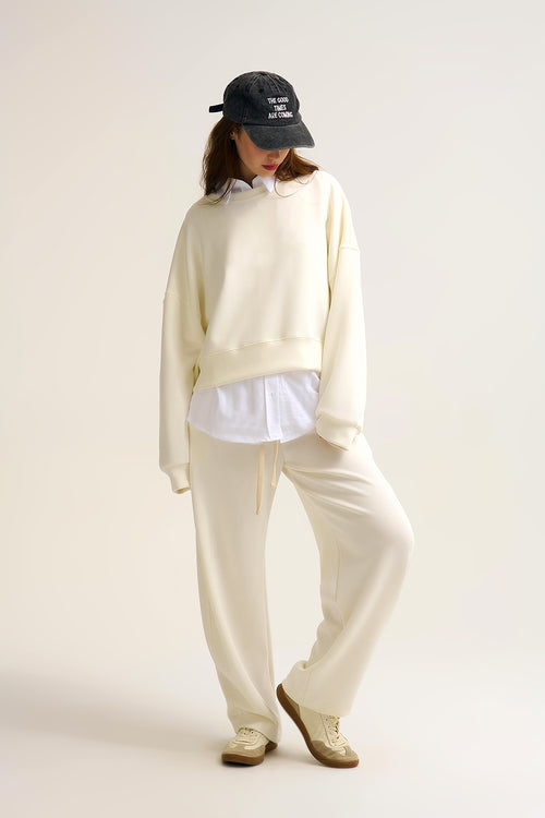 Crew Neck Dropped Shoulder Basic Sweatshirt in Cream