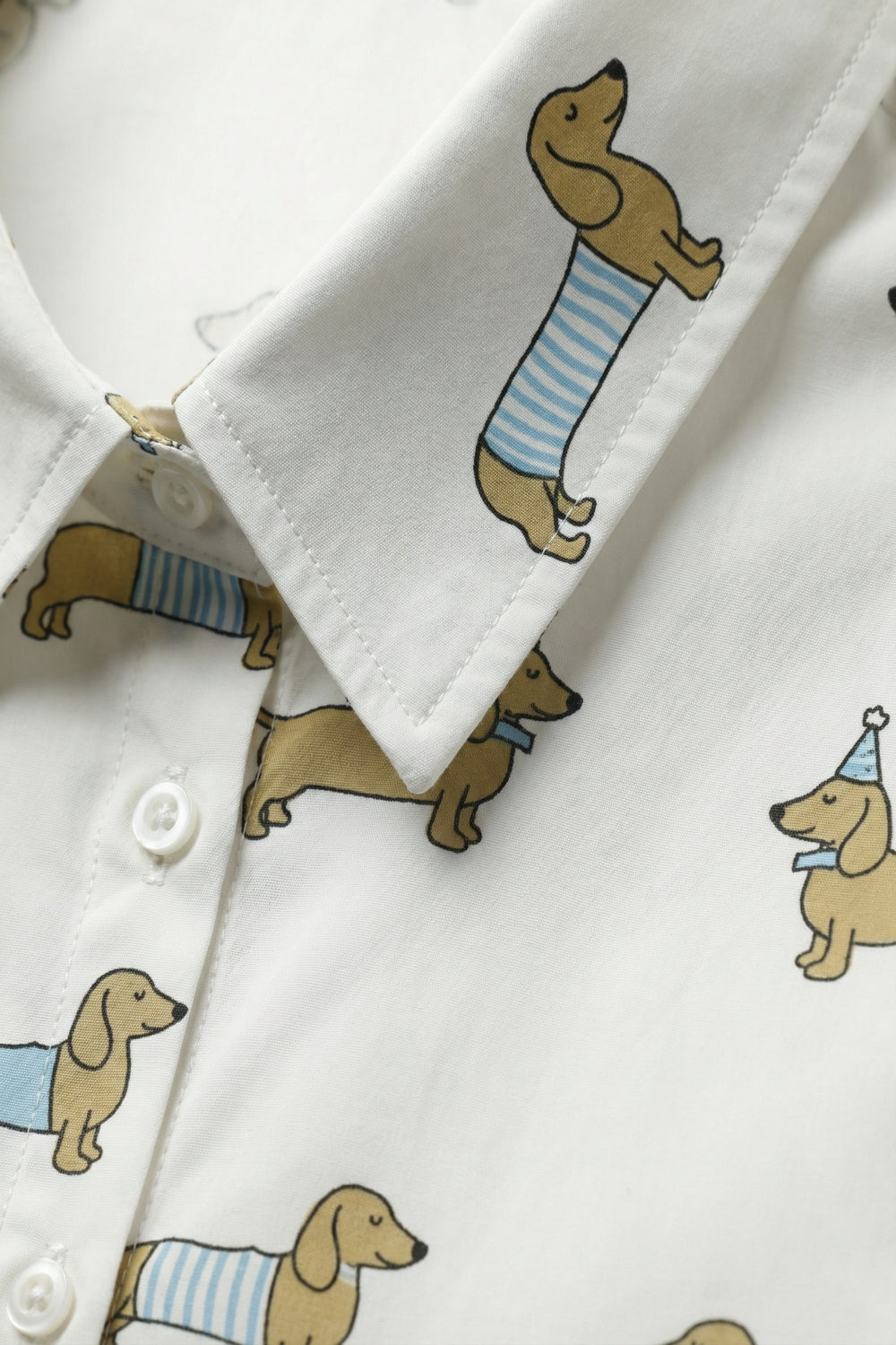 White Button-Up Shirt with Playful Dog Print
