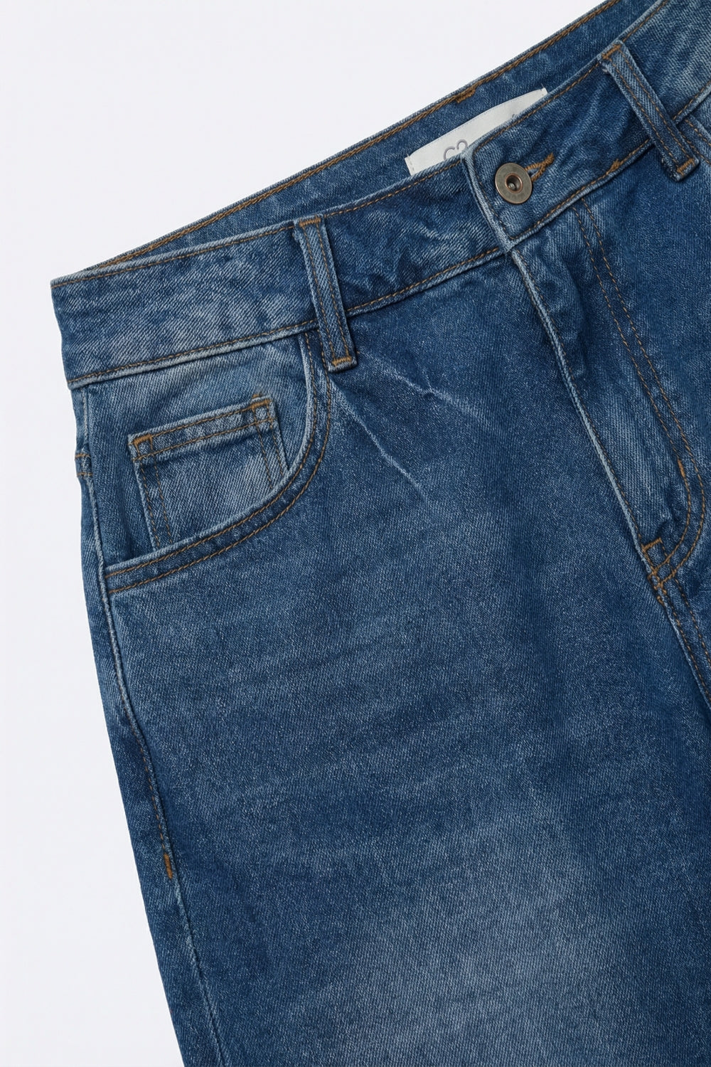 medium wash Barrel jeans with knee seam detail
