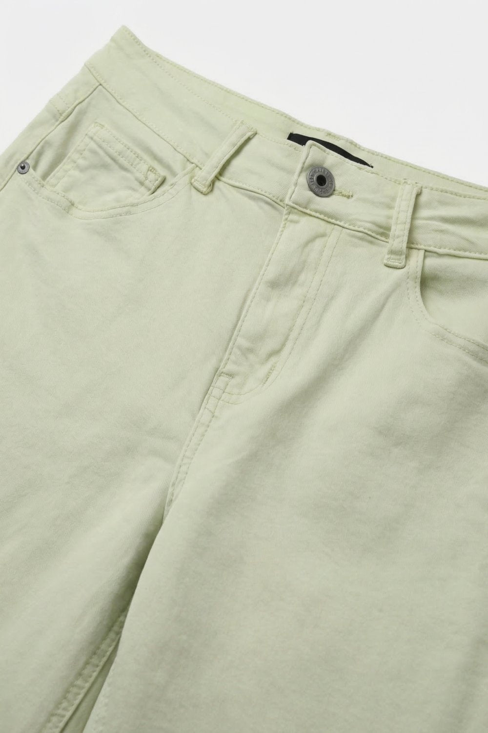 Stretch-denim Bermuda shorts in Mint Green