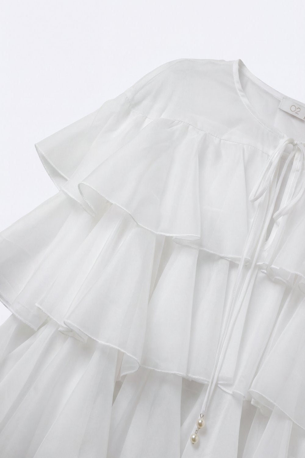 White Tiered Ruffle Peplum Blouse with Tie Neck