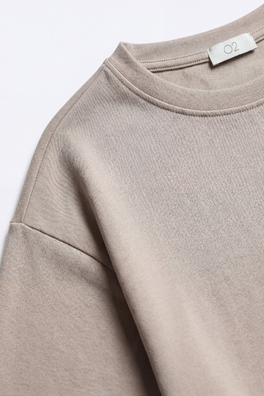 UNIKCOSA Relaxed Fit Short Sleeve Crewneck sweatshirt in beige