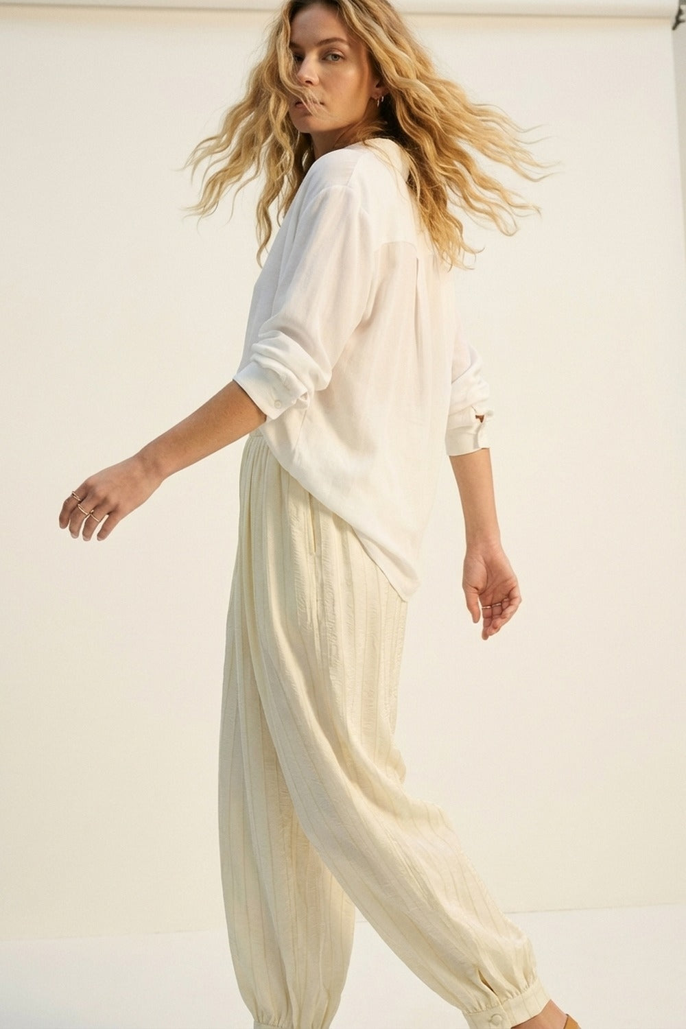 Cream Textured High-Waist Balloon Pants with Buttoned Cuffs