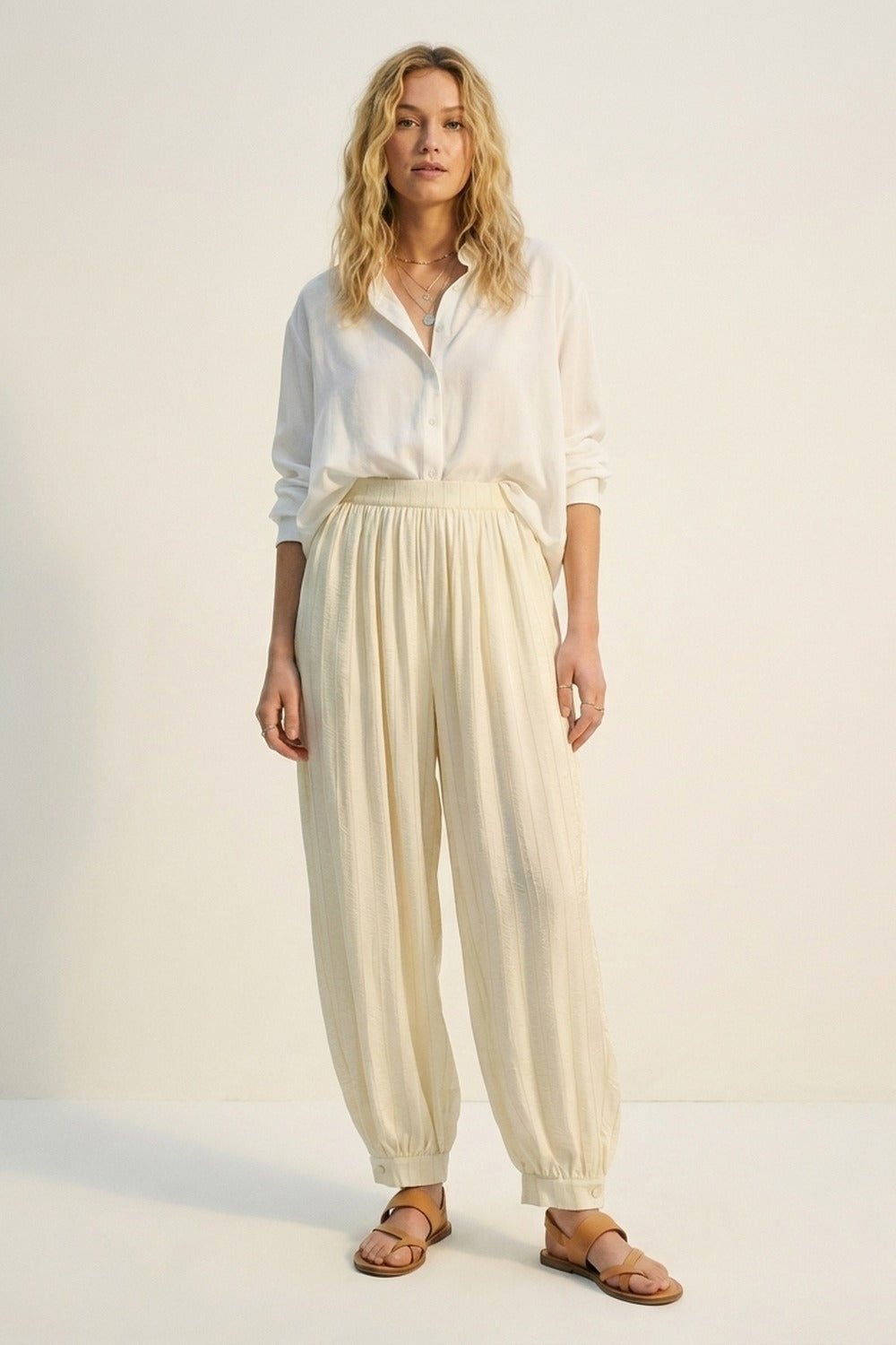 Cream Textured High-Waist Balloon Pants with Buttoned Cuffs