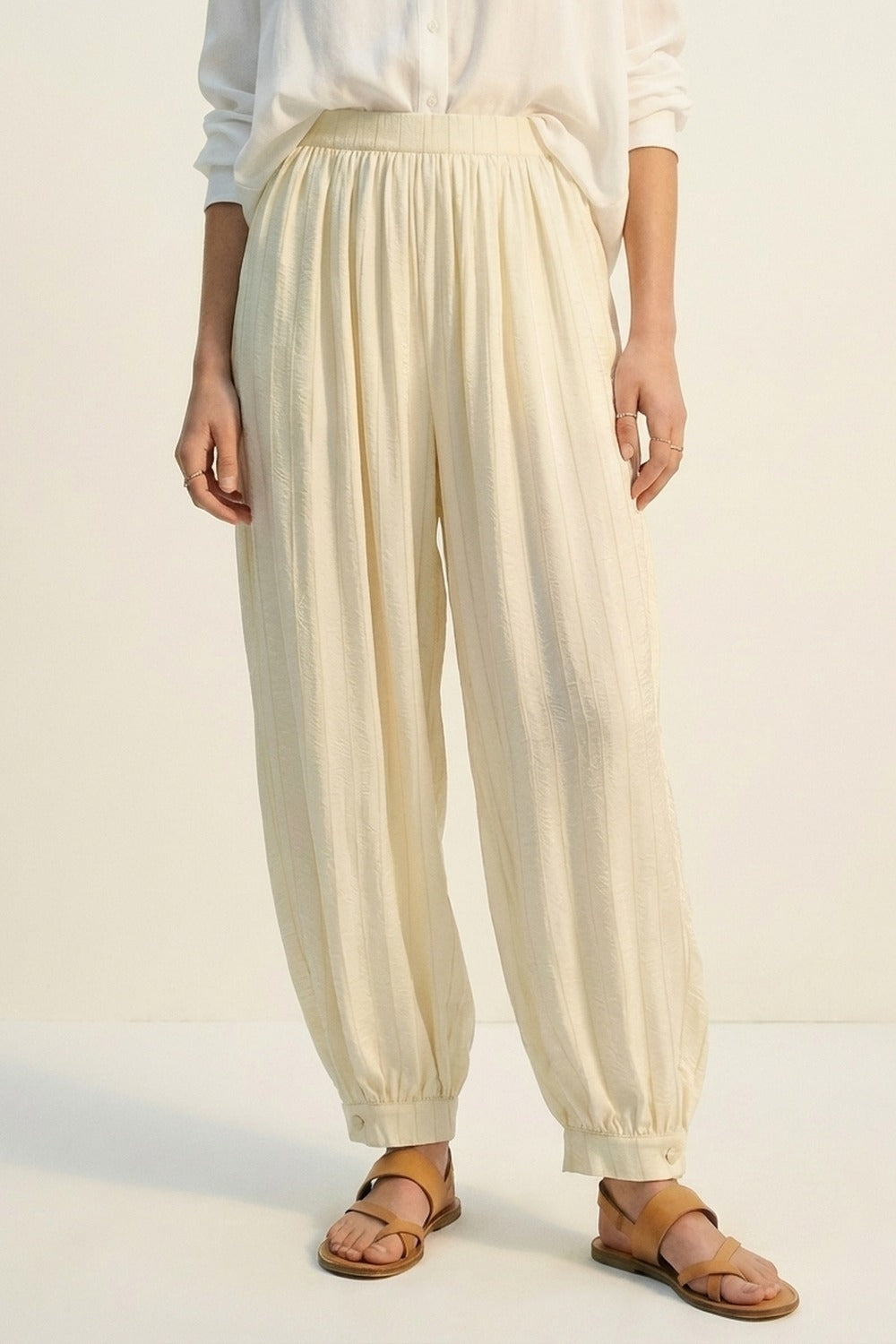 Cream Textured High-Waist Balloon Pants with Buttoned Cuffs