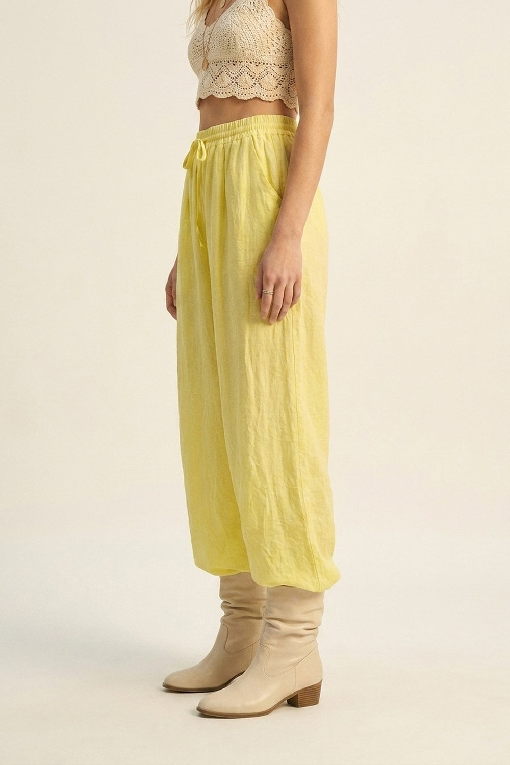 Yellow Wide-Leg Drawstring Pants with sheer fabric