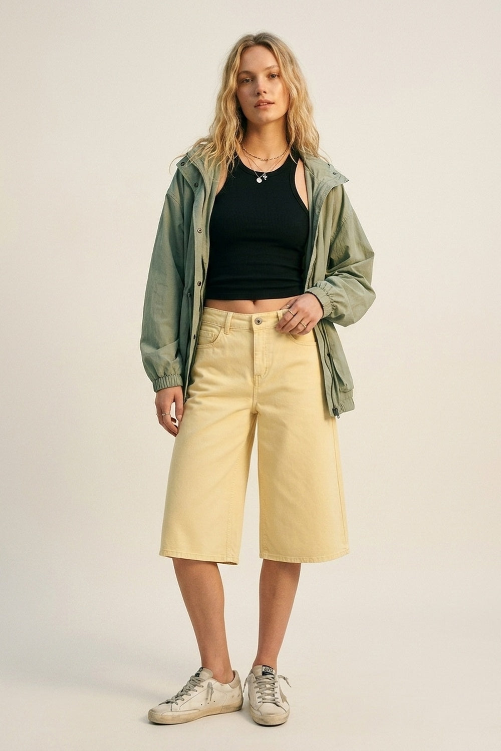 Stretch-denim Bermuda shorts in Butter Yellow