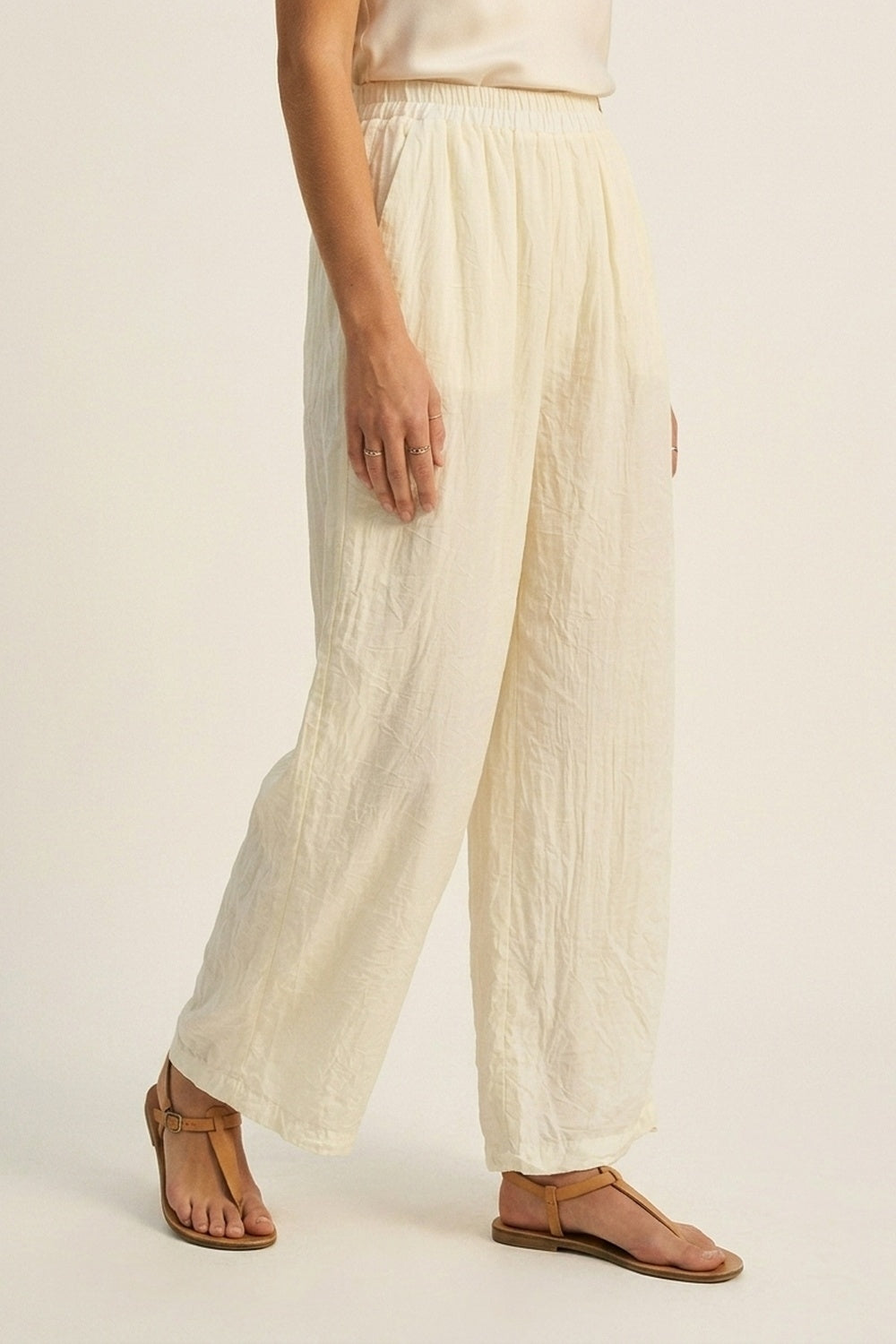 Cream Wide-Leg Pants with sheer fabric
